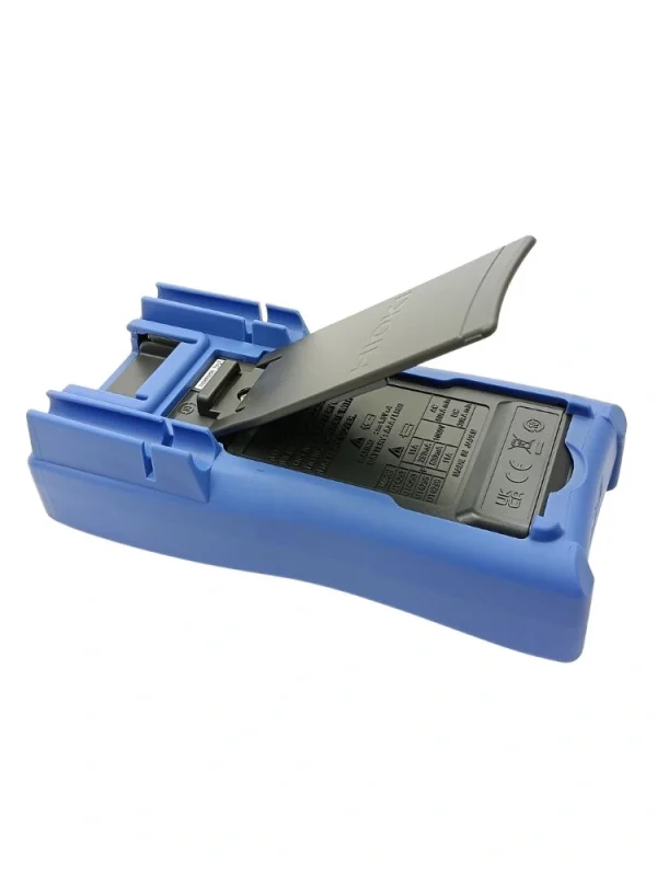 “Rear view of Hioki DT4252 digital multimeter showing the open tilt stand, safety specifications label, and battery compartment”