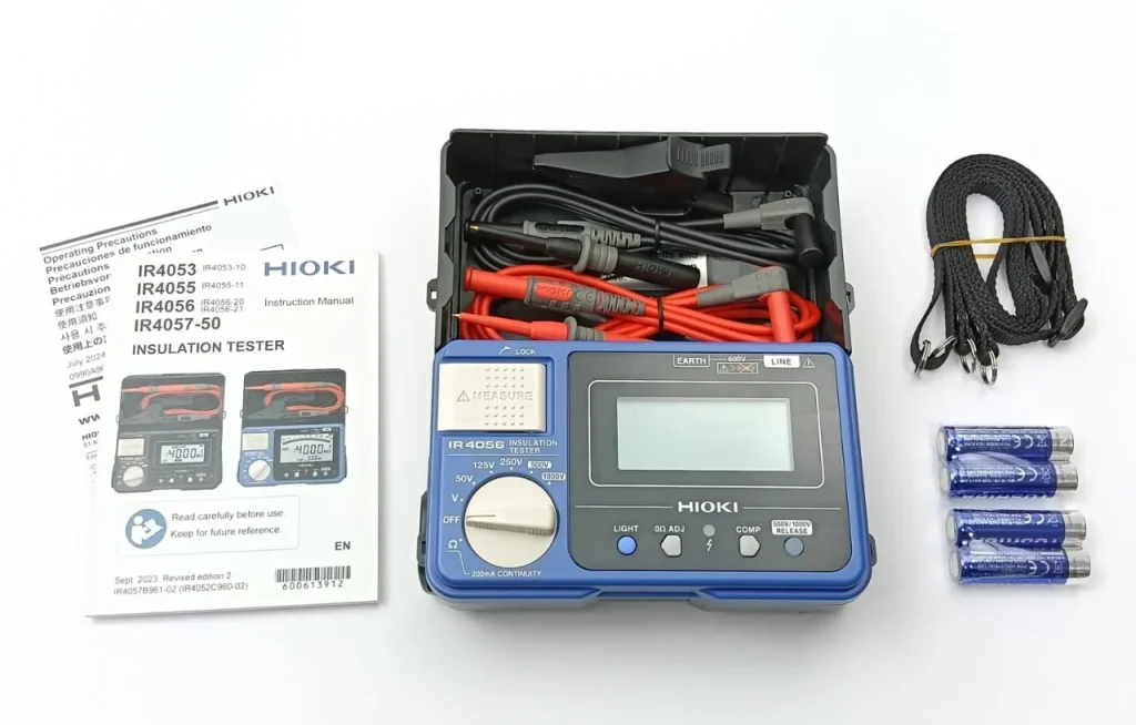 Hioki IR4056-20 Insulation Tester 1 Hioki Ir4056 Insulation Tester Kit Featuring The Main Megohmmeter Unit, Integrated Test Leads, Carrying Strap, And Instruction Manual For Electrical Maintenance.